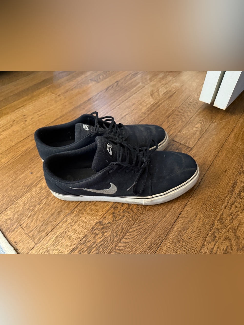 Nike Men’s Black Sneakers with White Swoosh
